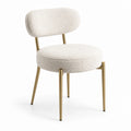 Sedia in bouclé crema con struttura dorata